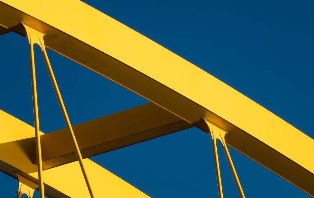 fragments-modern-yellow-construction-with-blue-background